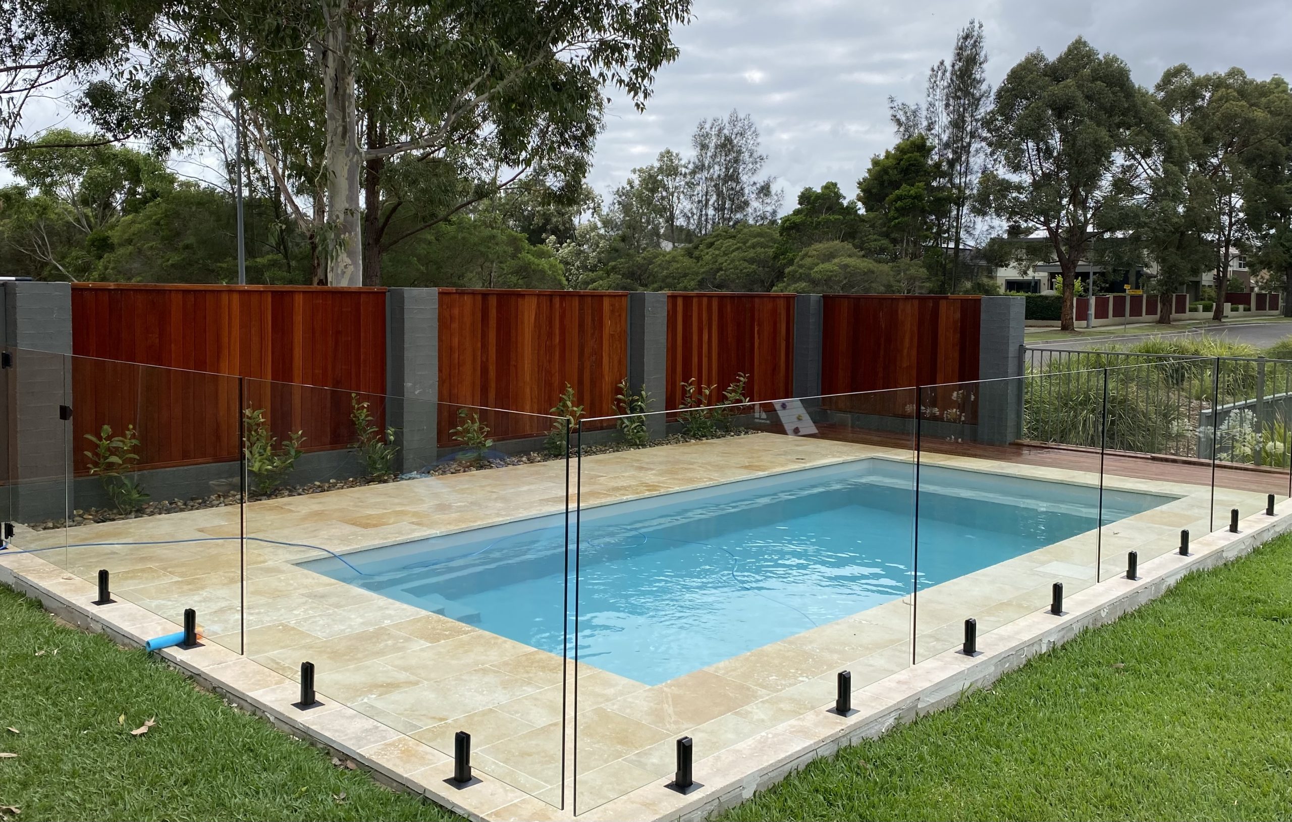 A 6.5 m Serenity fibreglass pool in Whitehaven finish
