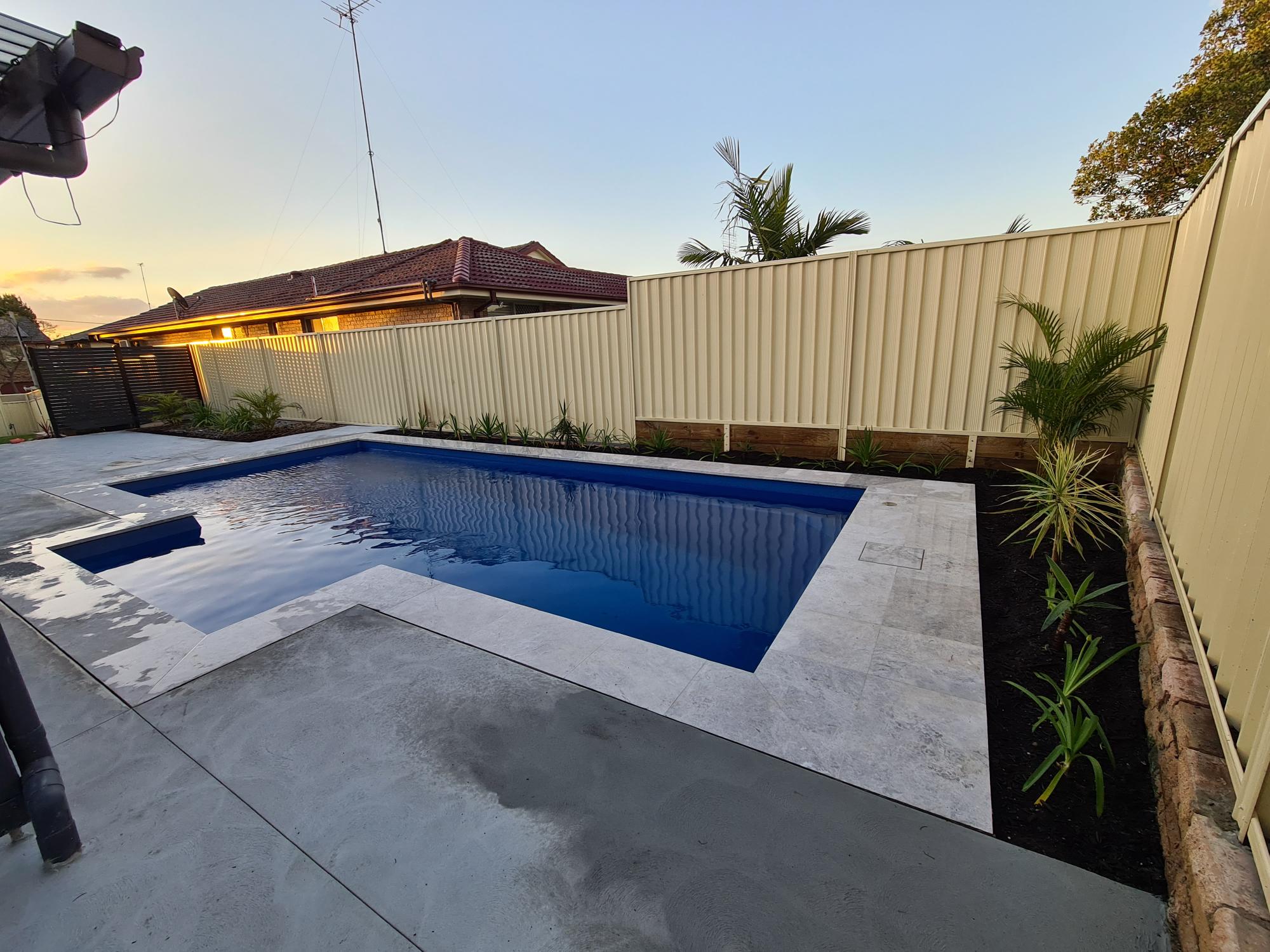 An 8 m Lifestyle fibreglass pool in Crystal Blue Shimmer